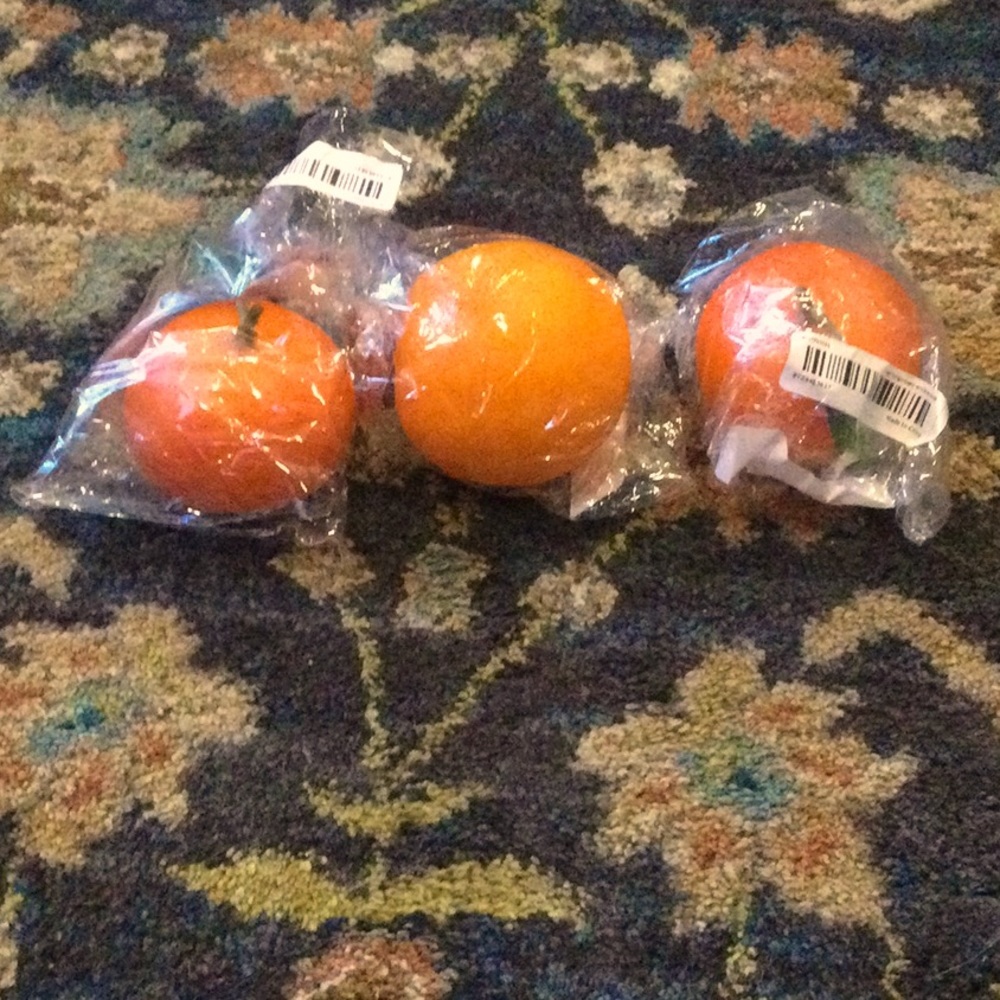 Three Artifical Realistic Fake Lifelike Oranges